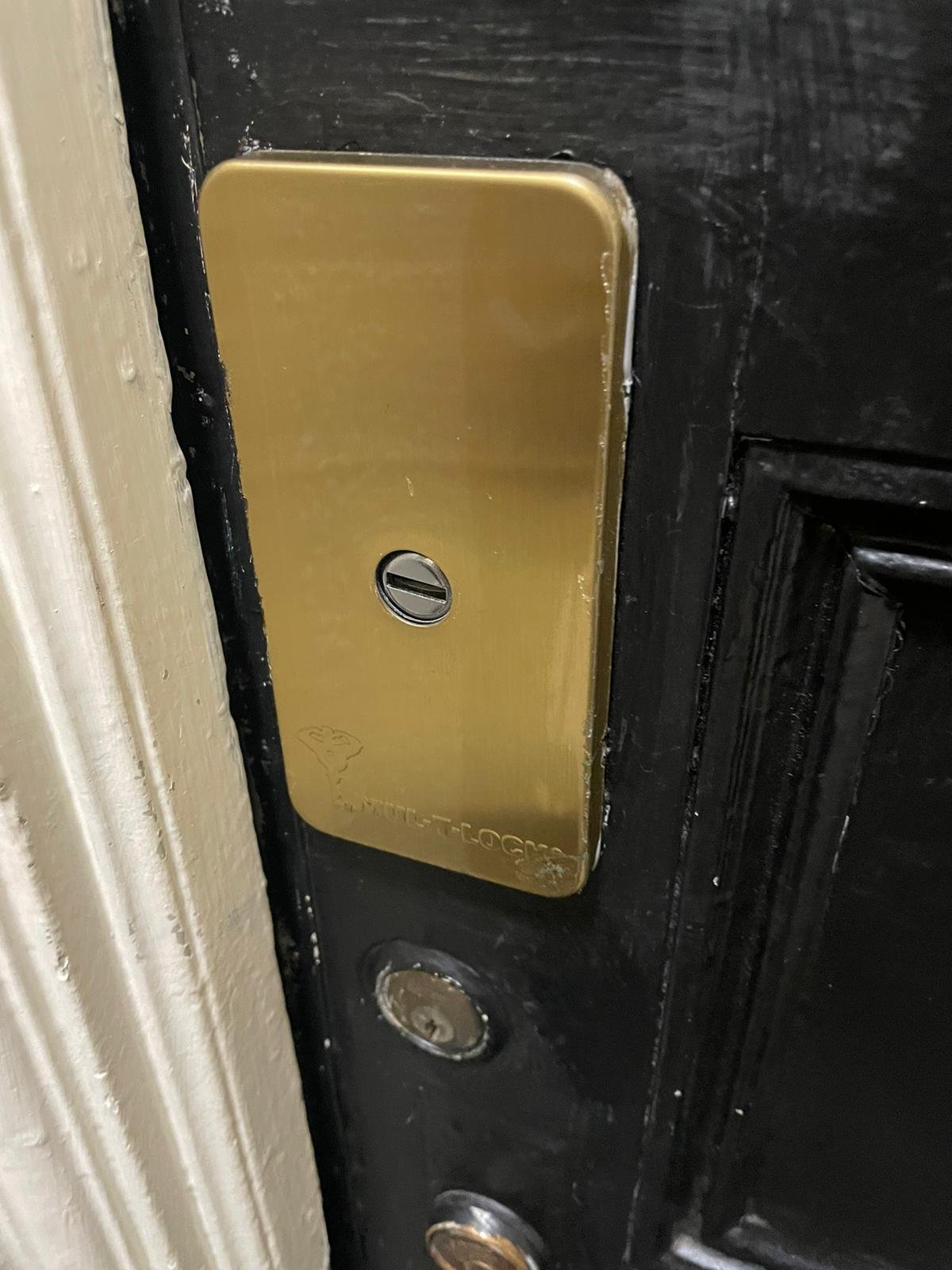 Keypad access control installed for a small business entry.